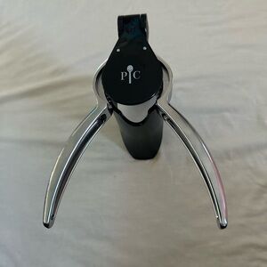 The Pampered Chef Black and Silver Champagne Opener